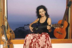 Photo Herlinde Koelbl-Lucia Aliberti-plays the old guitar of her grandfather Enrico-Villa Bellini-Savoca-Sicily-Photo Shooting :http://www.luciaaliberti.it #luciaaliberti #guidar #villabellini #savoca #sicily #relaxing 