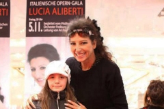 Photo Muller Company-Lucia Aliberti-Received the Compliments from a Little Fan-Cute and Sweet Picture-Muller Industry Company-Autograph Session-Ulm-Special Gala Concert-Escada Fashion:http://www.luciaaliberti.it #luciaaliberti #mullerindustrycompany #theaterulm #ulm #autographsession #fans #escadafashion