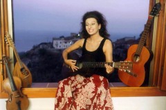 Photo Herlinde Koelbl-Lucia Aliberti-plays the old guitar of her grandfather Enrico-Villa Bellini-Savoca-Sicily-Photo Shooting :http://www.luciaaliberti.it #luciaaliberti #guidar #villabellini #savoca #sicily #relaxing 