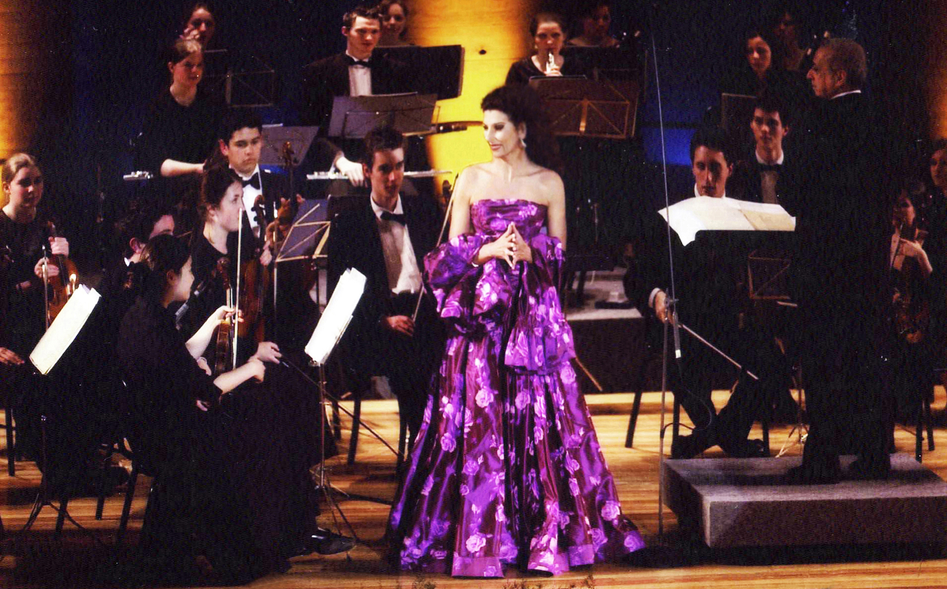 Lucia Aliberti with the conductor Lawrence Foster⚘Special Gala Concert⚘In Honor of Prince Charles of England⚘Théâtre des Nations⚘Paris⚘Purcell School Orchestra⚘Unesco⚘Photo taken from the Newspaper⚘Escada Fashion⚘:http://www.luciaaliberti.it #luciaaliberti #lawrencefoster #théâtredesnations #paris #galaconcert #purcellschoolorchestra #inhonorofprincecharlesofengland #unesco #escadafashion